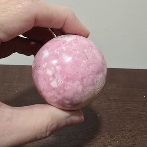 0.7 lbs Pink Rhodonite Crystal Sphere 56 mm